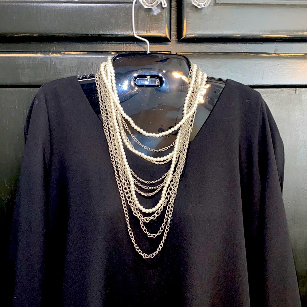 Assorted length 11 strand pearl and chain necklace